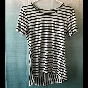 Gorgeous tunic top with peplum style back